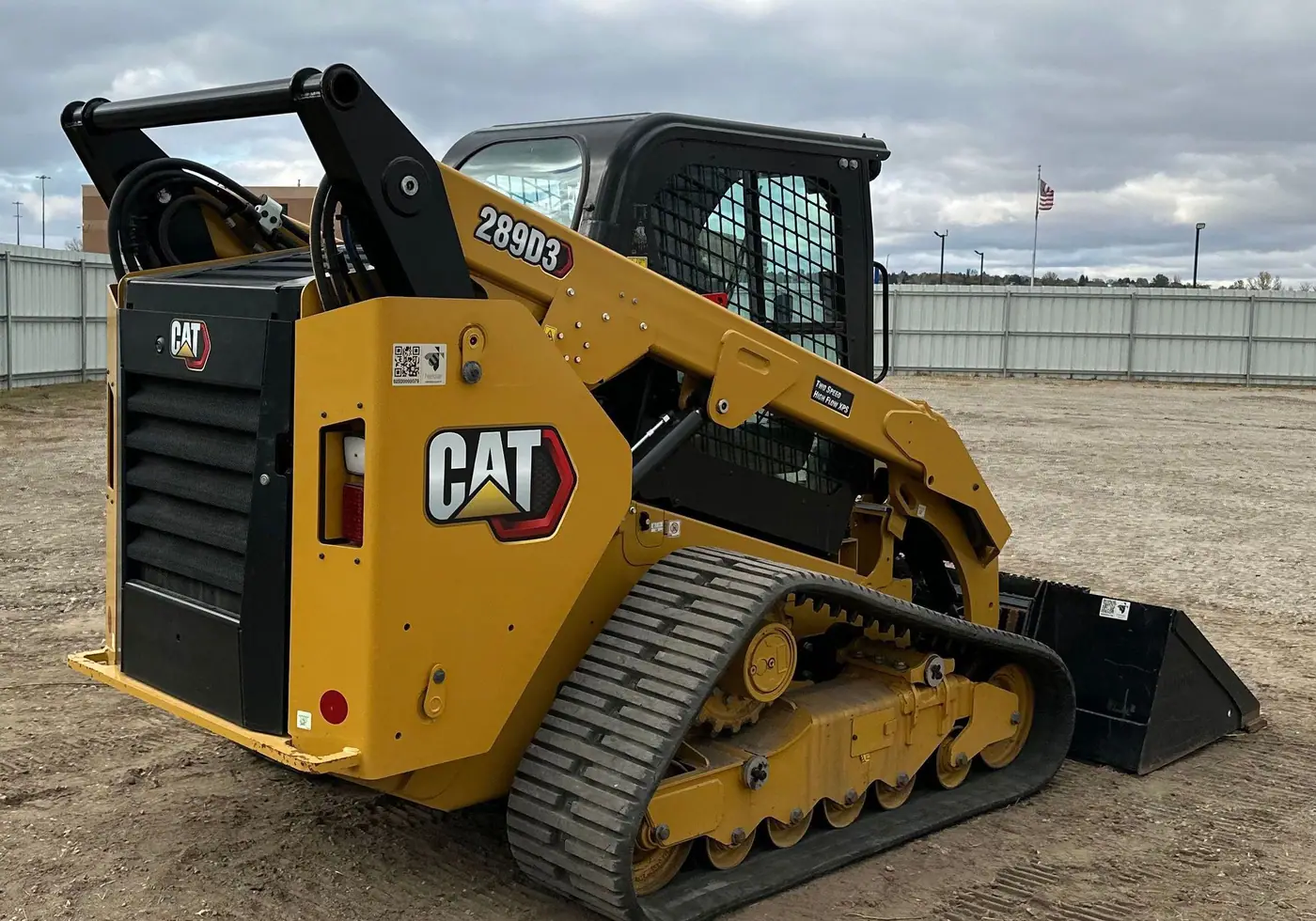 Detail view of a Caterpillar skid steer loader